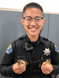 Officer Pham with Ducklings